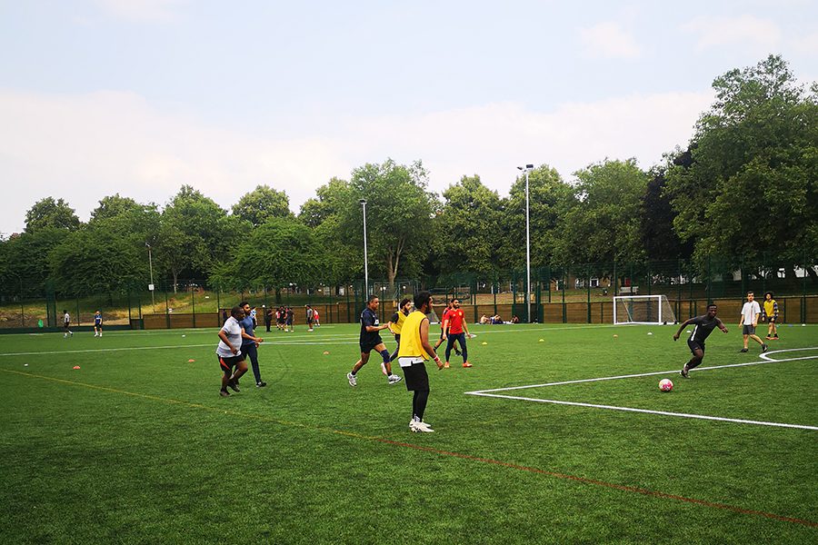 CANDI students and teachers hit the pitch for end of year match